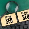 Magnifying,Glass,,Laptop,Keyboard,And,Paper,With,The,Words,On-page Magnifying,Glass,,Laptop,Keyboard,And,Paper,With,The,Words,On-page